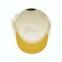 Ivory/Yellow Salerno Linen Newsboy Hat with yellow visor and button on white background