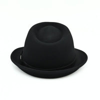 A Black classic alpine hat with a matching black band, on a clean white background
