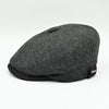 side view: charcoal Shetland Wool Leather-Trim Newsboy hat handmade in Italy –  showing leather visor.”
