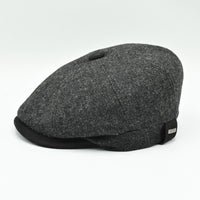 side view: charcoal Shetland Wool Leather-Trim Newsboy hat handmade in Italy –  showing leather visor.”