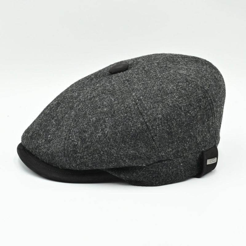 side view: charcoal Shetland Wool Leather-Trim Newsboy hat handmade in Italy –  showing leather visor.”