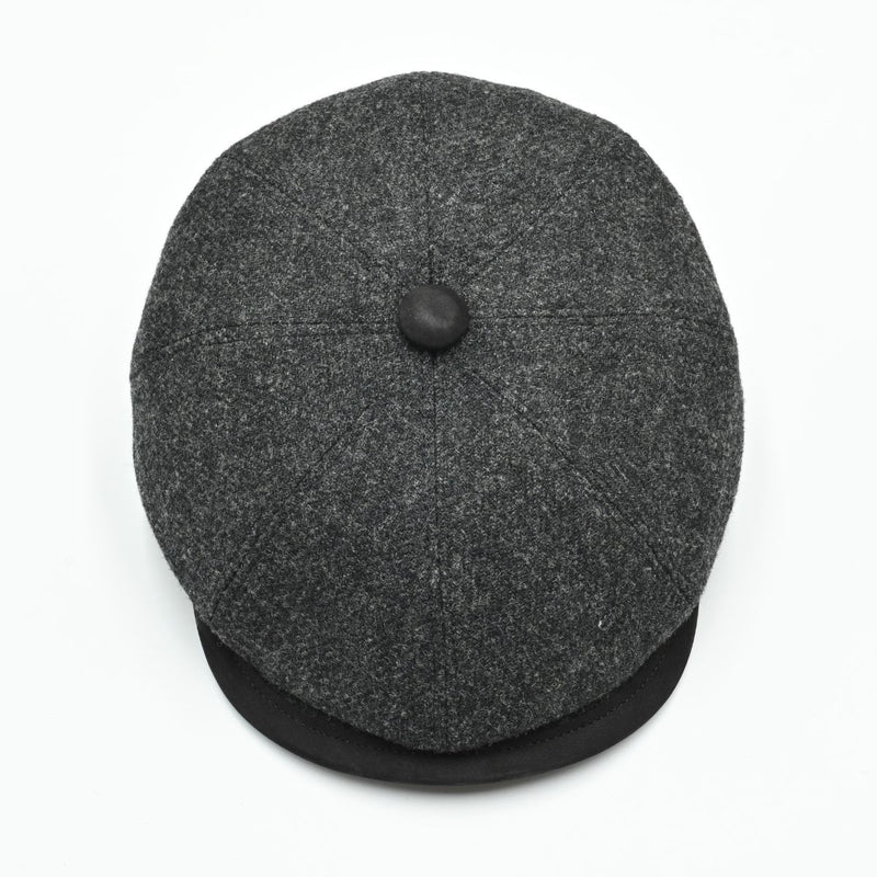 Top view: charcoal Shetland Wool Leather-Trim Newsboy hat handmade in Italy –  showing leather visor.”