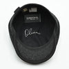 inside view: charcoal Shetland Wool Leather-Trim Newsboy hat handmade in Italy –  showing leather visor.”