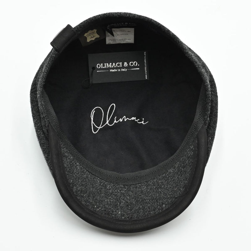 inside view: charcoal Shetland Wool Leather-Trim Newsboy hat handmade in Italy –  showing leather visor.”