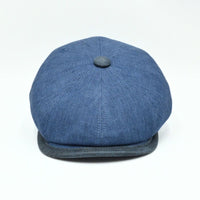 Blue Italian Linen Newsboy Hat with leather accents on a white background