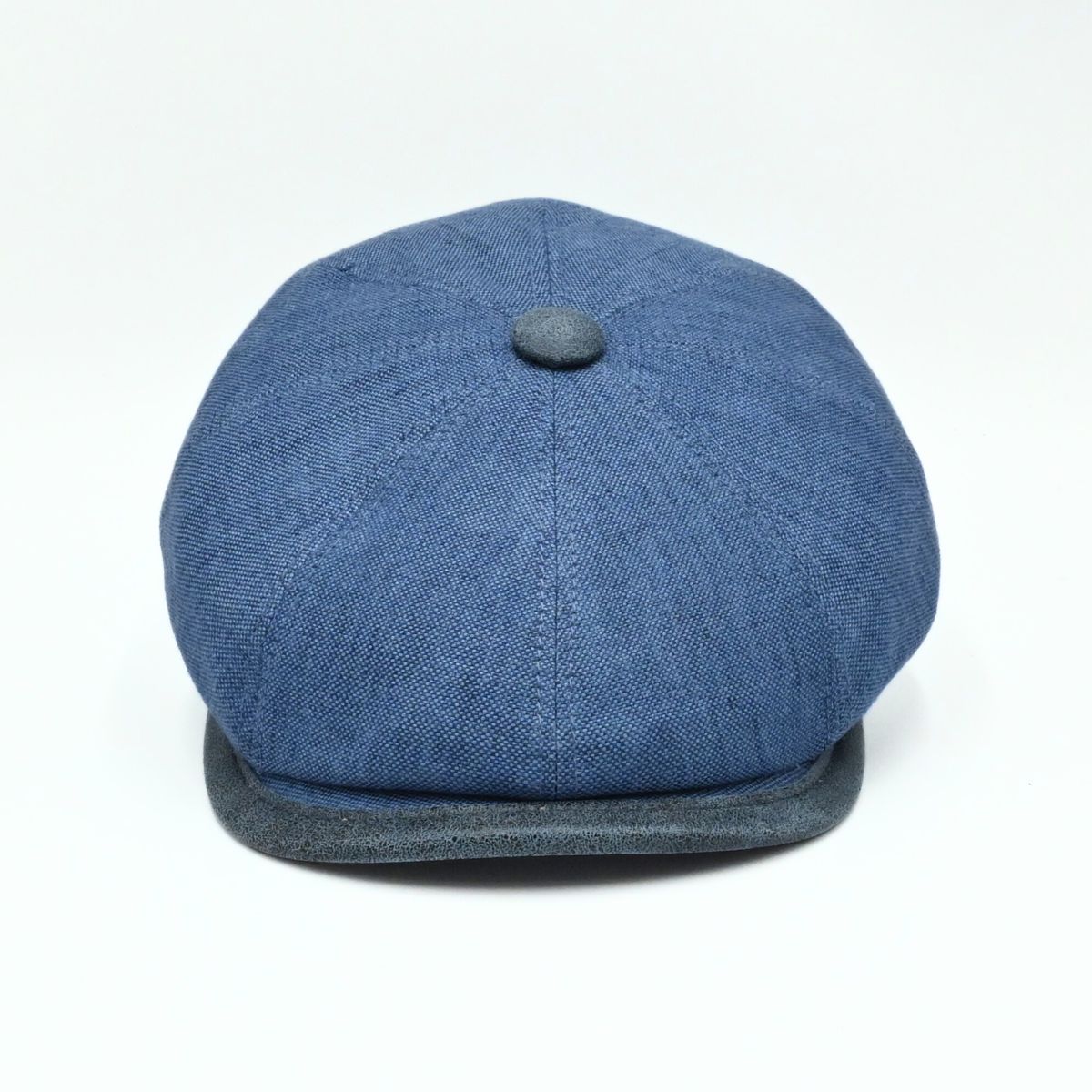 Blue Italian Linen Newsboy Hat with leather accents on a white background