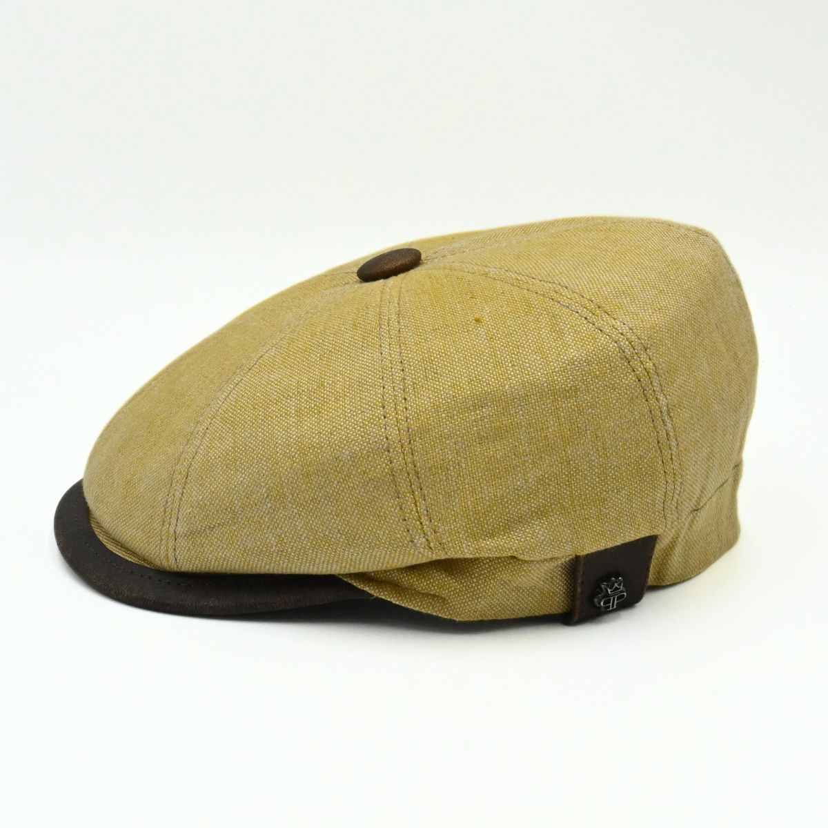 mustard Italian Linen Newsboy Hat with leather accents on a white background