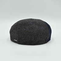 Back view of the navy Bergamo Cap – Italian-made wool patchwork design