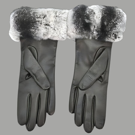 A pair of black women's leather gloves featuring a luxurious gray chinchilla fur trim, displayed on a gray background with both gloves elegantly positioned.