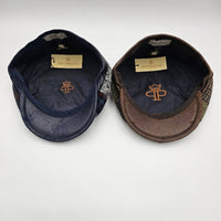 blue and brown newsboy hat inside view