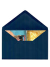 Birthday card in open blue envelope