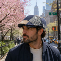man in multicolor Jeans Patchwork Cap in NYC